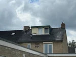 Een pannendak vervangen.