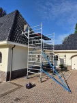 Schilder werk buiten van  dakgoten raamkozijnen en deuren