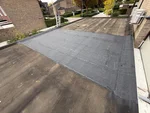 Een garage box overlaagd met APP- Gemodificeerde bitume.