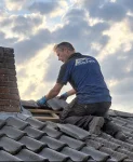 reparatie van beschadigde dakpannen