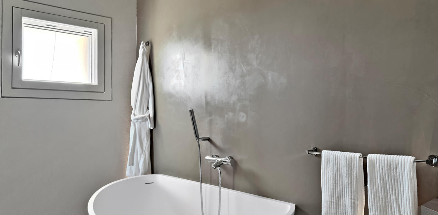 Betonlook verf kosten? Prijs betonlook muur & wanden | Slimster