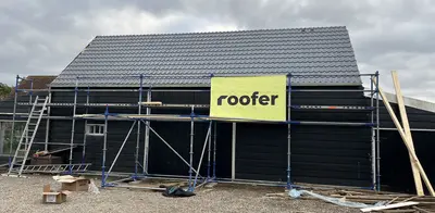 Vervanging van hellend daksysteem inclusief draagconstructie, zinken dakgoten en isolatie.