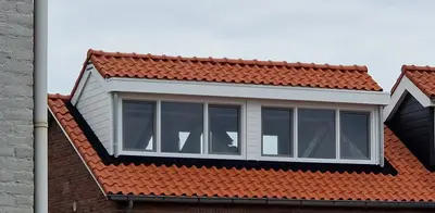 Enkelzijdige nokverhoging i.c.m. dakkapel aan de voorzijde Prinsenbeek-2